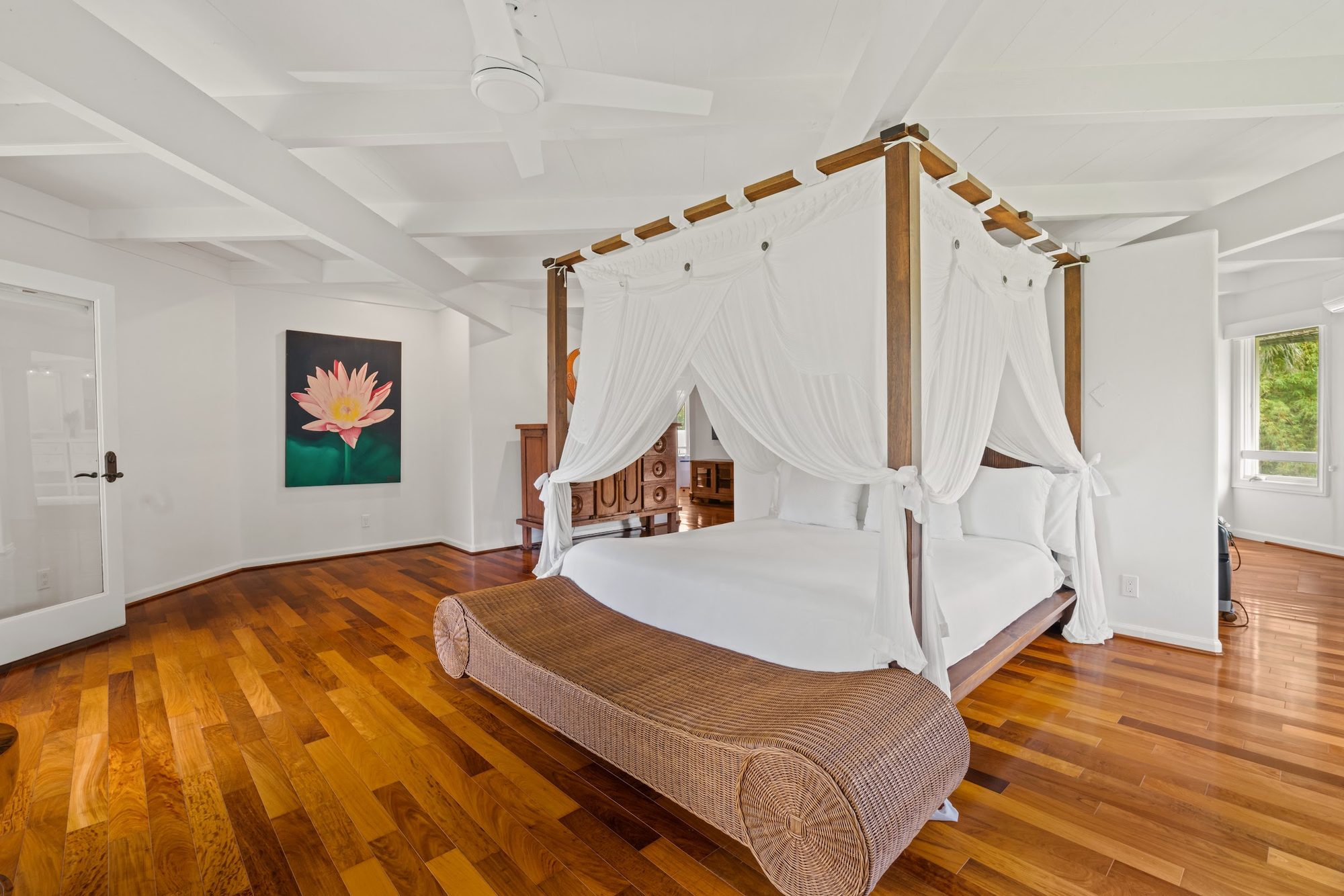 Bedroom with draped four-poster